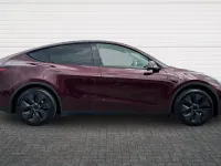 Used Tesla Model Y Long Range RWD 85 kW (116 HP) 2025 Red SUV