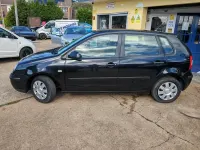 Begagnad VW Polo S 2005 Svart Halvkombi