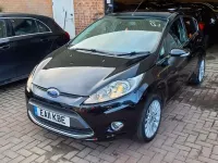 Używany Ford Fiesta Titanium 94 KM (69 kW) 2011 Czarny Hatchback