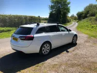 Second-hand Vauxhall Insignia Design Edition 140 CP (102 kW) 2014 Alb Break
