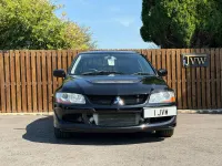 Used Mitsubishi Lancer 261 HP (191 kW) 2004 Black Sedan