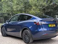 Used Tesla Model Y Long Range AWD 378 kW (514 HP) 2024 Blue SUV