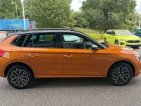 Used Skoda Kamiq Design Edition 113 HP (83 kW) 2025 Phoenix orange metallic black magic pearl effect SUV