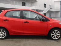 Używany Mazda 2 75 KM (55 kW) 2014 Czerwony Hatchback