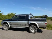 Second-hand Mitsubishi L200 113 CP (83 kW) 2004 Negru Pickup