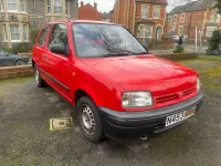 Begagnad Nissan Micra 54 HK (39 kW) 1995 Röd Halvkombi