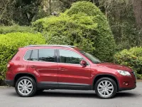 Second-hand VW Tiguan Sport 140 CP (102 kW) 2010 Roșu SUV