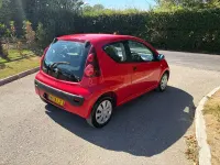 Used Peugeot 107 Access 68 HP (50 kW) 2014 Red Hatchback