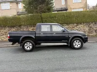 Usado Mitsubishi L200 113 CV (83 kW) 2006 Negro Pickup/Camioneta