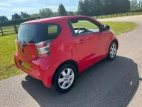 Used Toyota iQ 68 HP (50 kW) 2009 Red Hatchback