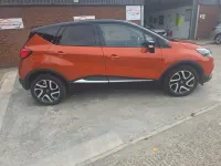 Used Renault Captur Dynamique 90 HP (66 kW) 2017 Orange/black SUV