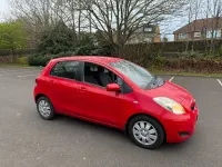 Used Toyota Yaris 90 HP (66 kW) 2009 Red Hatchback
