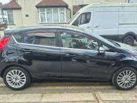 Used Ford Fiesta Titanium 125 HP (91 kW) 2013 Black Hatchback