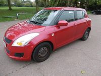 Used Suzuki Swift 2011 Monza red mett Hatchback