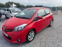Used Toyota Yaris 90 HP (66 kW) 2014 Red Hatchback