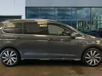 Used VW Touran R-line 150 HP (110 kW) 2025 Dolphin grey metallic MPV