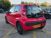 Second-hand Peugeot 107 68 CP (50 kW) 2009 Roșu Hatchback