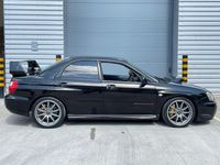 Begagnad Subaru Impreza 2003 Svart Sedan
