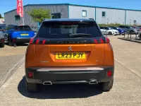 Second-hand Peugeot 2008 GT 129 CP (94 kW) 2023 Portocaliu SUV