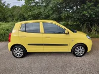 Used Kia Picanto 64 HP (47 kW) 2010 Yellow Hatchback