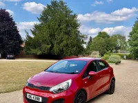 Used Kia Rio 84 HP (61 kW) 2013 Red Hatchback