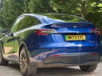 Used Tesla Model Y Long Range AWD 378 kW (514 HP) 2024 Blue SUV