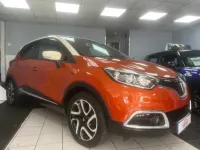 Used Renault Captur Dynamique 90 HP (66 kW) 2014 Orange/cream SUV