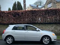 Used Toyota Corolla 110 HP (80 kW) 2003 Silver Hatchback