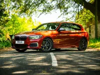 Used BMW M140 M Sport 435 HP (319 kW) 2018 Orange Hatchback