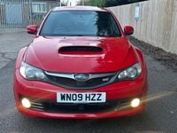 Used Subaru Impreza 2009 Red Hatchback
