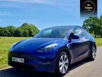Begagnad Tesla Model Y Long Range AWD 85 kW (116 HK) 2022 Blå SUV