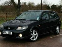 Used Mazda 323 Inclusive 129 HP (94 kW) 2002 Silver Hatchback
