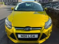 Used Ford Focus Titanium 125 HP (91 kW) 2011 Yellow Hatchback
