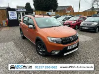 Używany Dacia Sandero Stepway 90 KM (66 kW) 2017 Pomarańczowy Hatchback