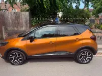 Used Renault Captur Dynamique 90 HP (66 kW) 2017 Orange/black SUV