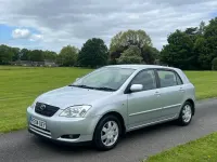 Used Toyota Corolla 97 HP (71 kW) 2004 Silver Hatchback