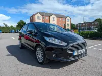 Used Ford Fiesta Titanium 75 HP (55 kW) 2014 Black Hatchback