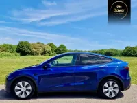 Begagnad Tesla Model Y Long Range AWD 85 kW (116 HK) 2022 Blå SUV