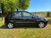 Used Ford Fiesta Zetec 80 HP (58 kW) 2006 Black Hatchback
