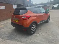 Used Renault Captur Dynamique 90 HP (66 kW) 2017 Orange/black SUV