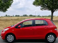 Used Toyota Yaris 101 HP (74 kW) 2009 Red Hatchback
