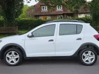 Used Dacia Sandero Lauréate 90 HP (66 kW) 2014 White Hatchback