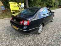 Second-hand VW Passat Highline 140 CP (102 kW) 2009 Negru Berlinǎ