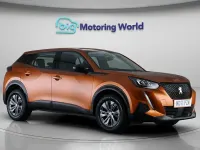Używany Peugeot 2008 Active Premium 100 KM (73 kW) 2022 Pomarańczowy SUV