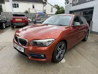 Used BMW 118 Sport Line 136 HP (100 kW) 2017 Sunset orange metallic paint Hatchback