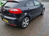 Używany Kia Rio 107 KM (78 kW) 2013 Czarny Hatchback