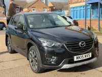 Second-hand Mazda CX-5 Inclusive 150 CP (110 kW) 2015 Negru SUV