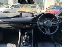 Używany Mazda 3 Inclusive 177 KM (130 kW) 2021 Czerwony Hatchback