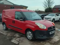 Używany Fiat Doblò 2014 Czerwony Minivan