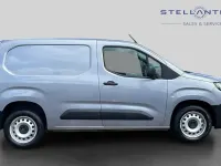 Używany Peugeot Partner S 101 KM (74 kW) 2024 Szary Minivan